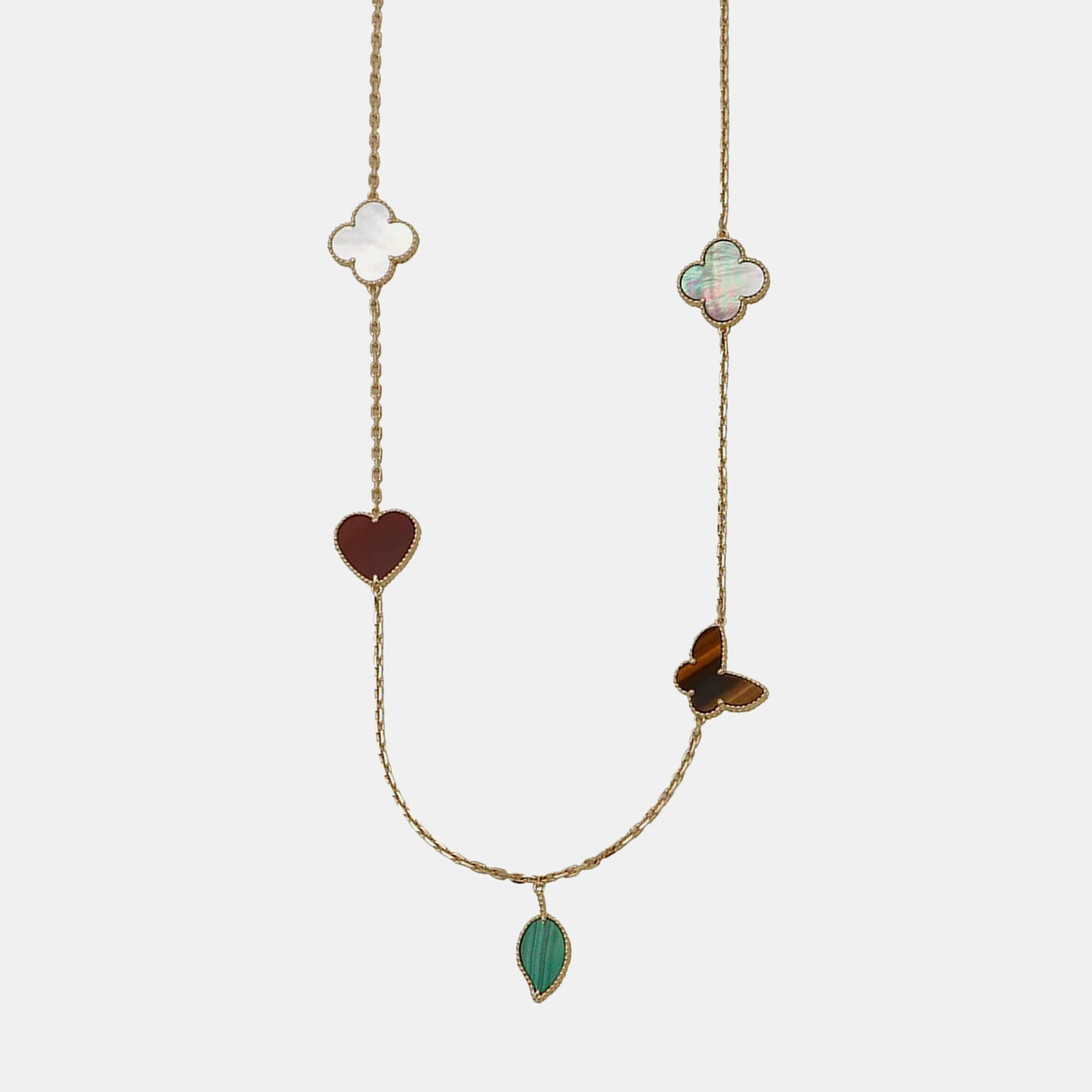 

Van Cleef & Arpels Lucky Alhambra 18K Yellow Gold Mother of Pearl Malachite Carnelian Tiger Eye 12 Motif Bracelet