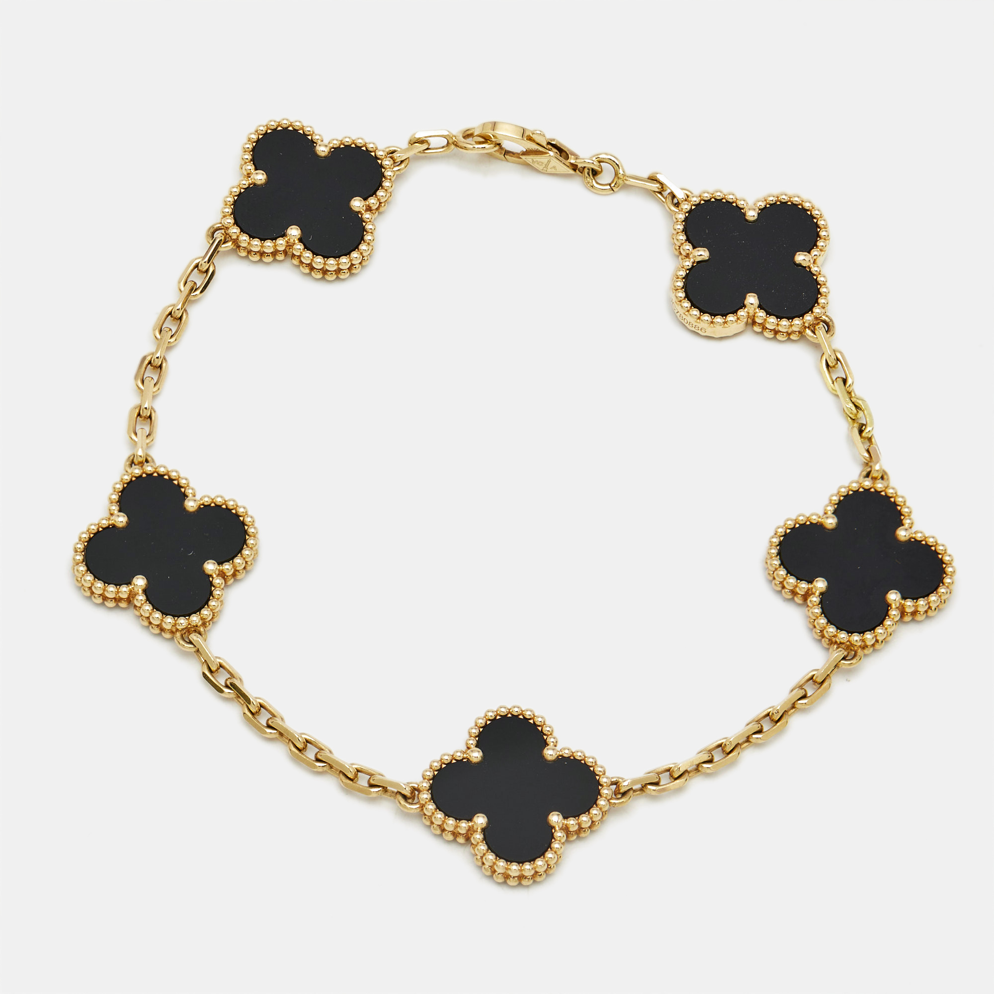 

Van Cleef & Arpels Vintage Alhambra Onyx 18k Yellow Gold 5 Motif Station Bracelet
