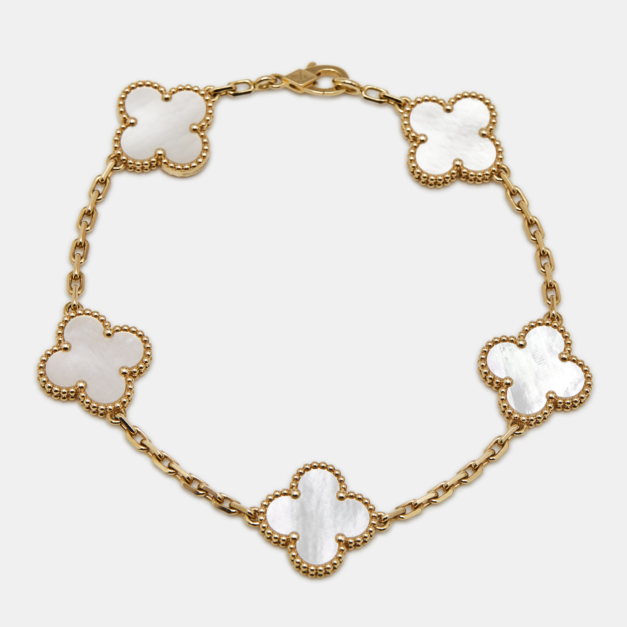 

Van Cleef & Arpels Vintage Alhambra Mother Of Pearl 18k Yellow Gold 5 Motif Station Bracelet