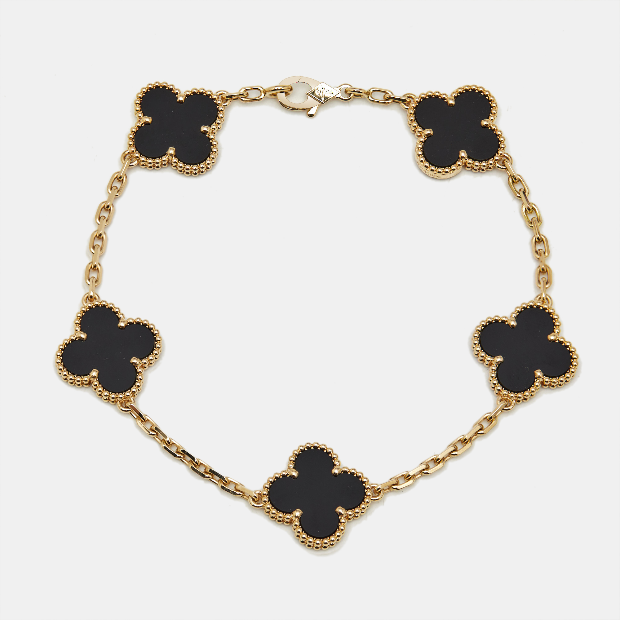 

Van Cleef & Arpels Vintage Alhambra Onyx 18k Yellow Gold 5 Motif Station Bracelet