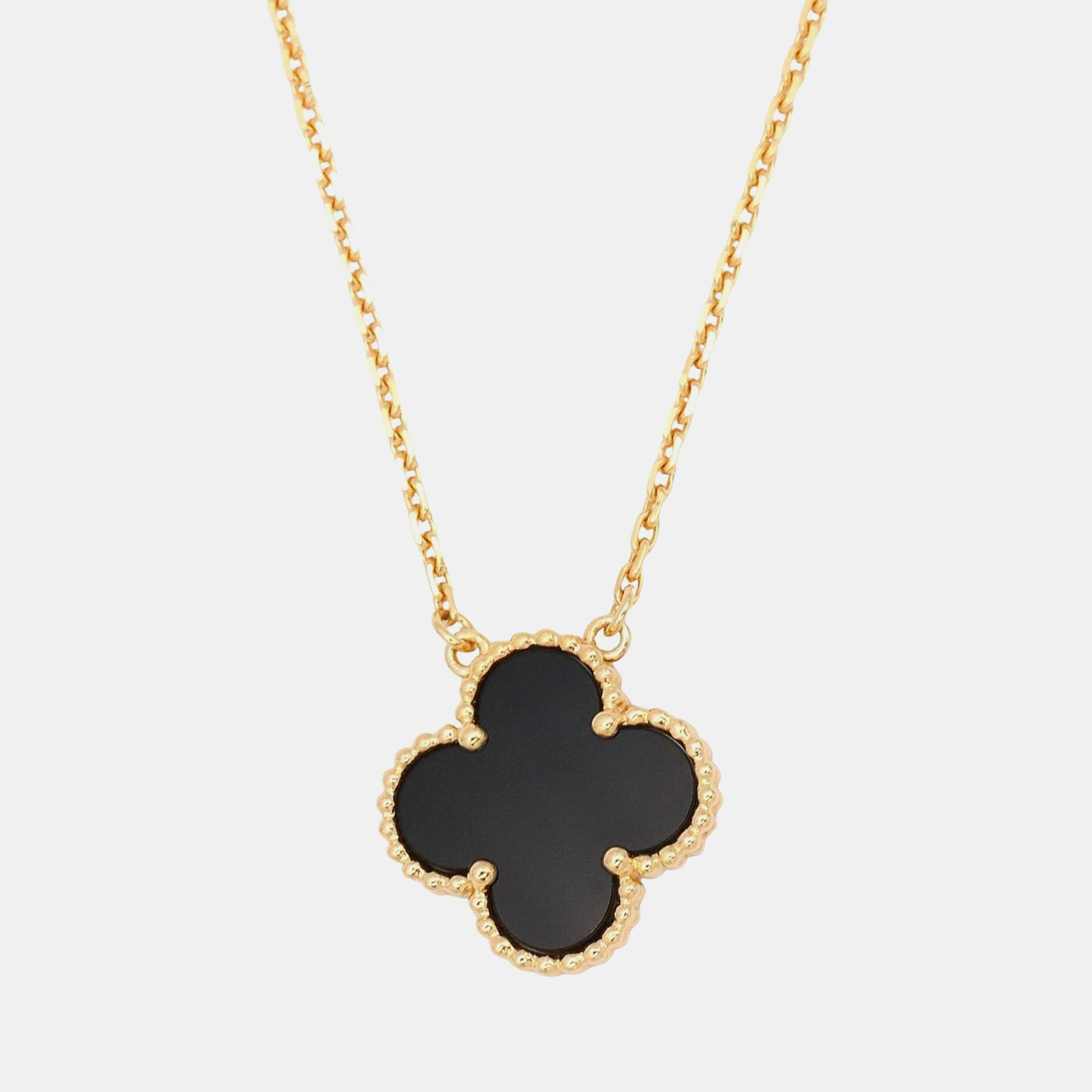 Click to view more detailed imagery on our partner's website Pre-owned Van Cleef & Arpels Vintage Alhambra Onyx 18k Yellow Gold Pendant Necklace