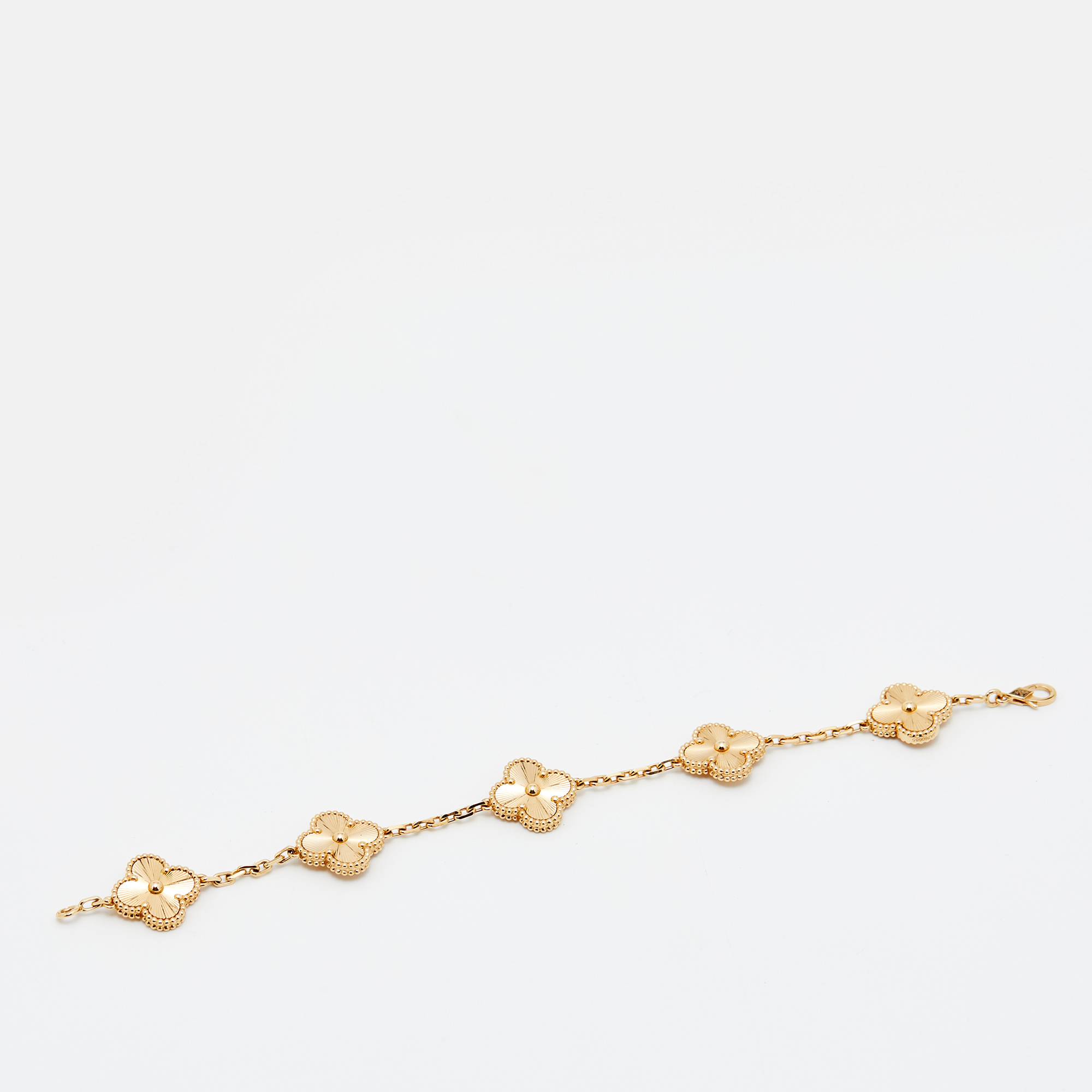 

Van Cleef & Arpels Vintage Alhambra Guilloché 18K Yellow Gold Station Bracelet