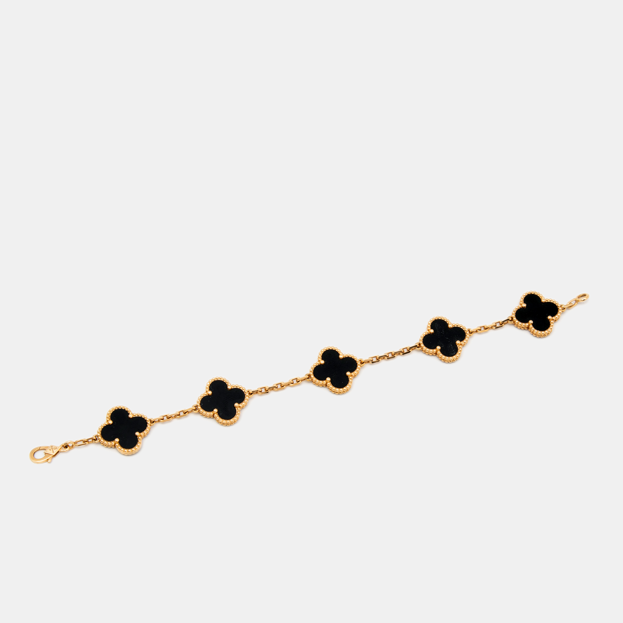 

Van Cleef & Arpels Vintage Alhambra Onyx 18k Yellow Gold 5 Motif Station Bracelet