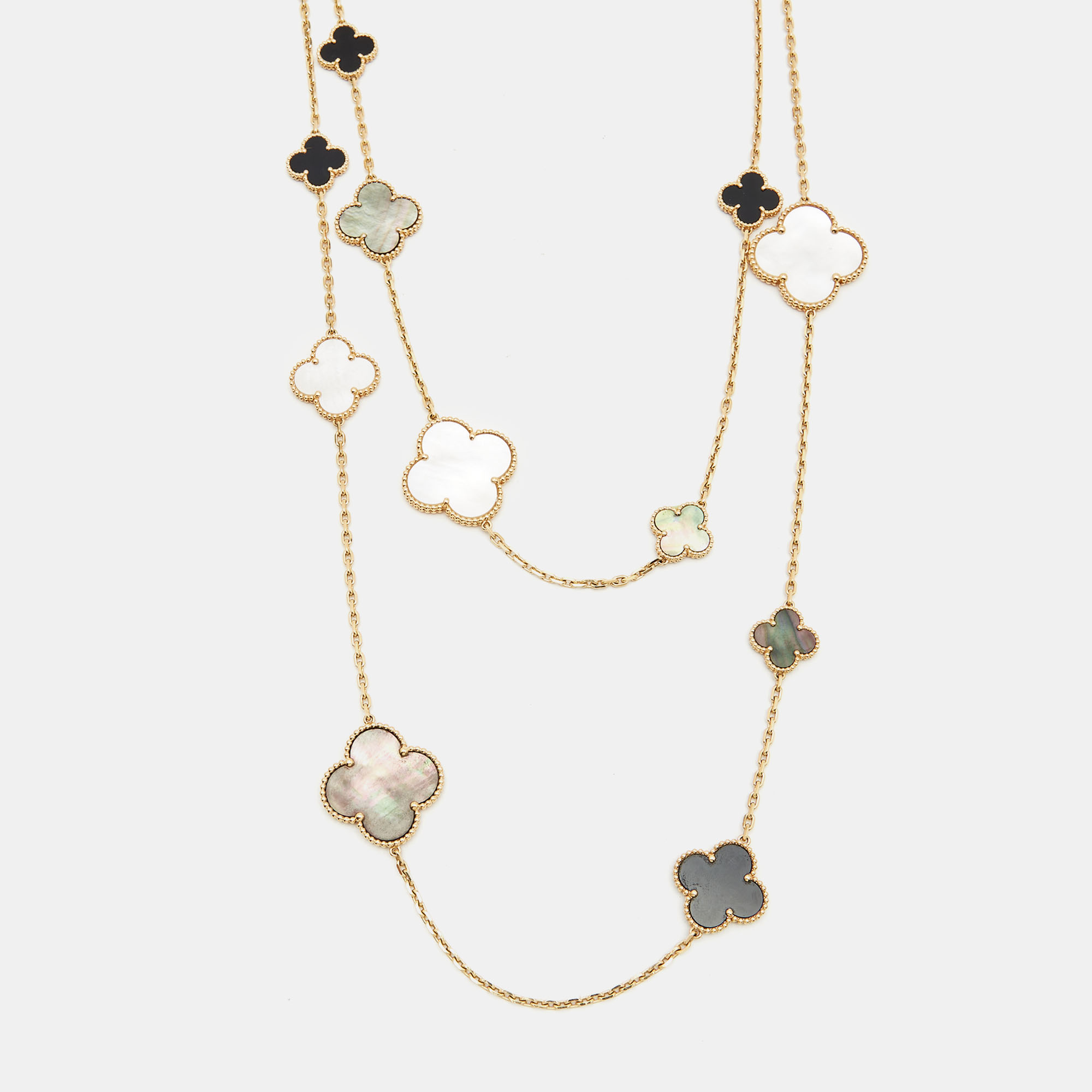 

Van Cleef & Arpels Magic Alhambra 16 Motif Mother of Pearl Onyx 18k Yellow Gold Long Station Necklace