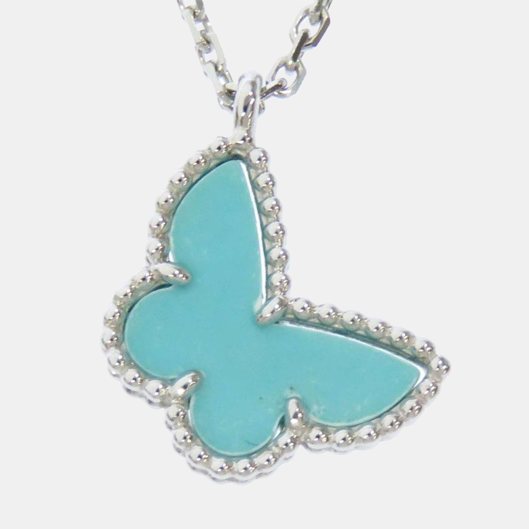 

Van Cleef & Arpels 18K White Gold and Turquoise Sweet Alhambra Butterfly Pendant Necklace