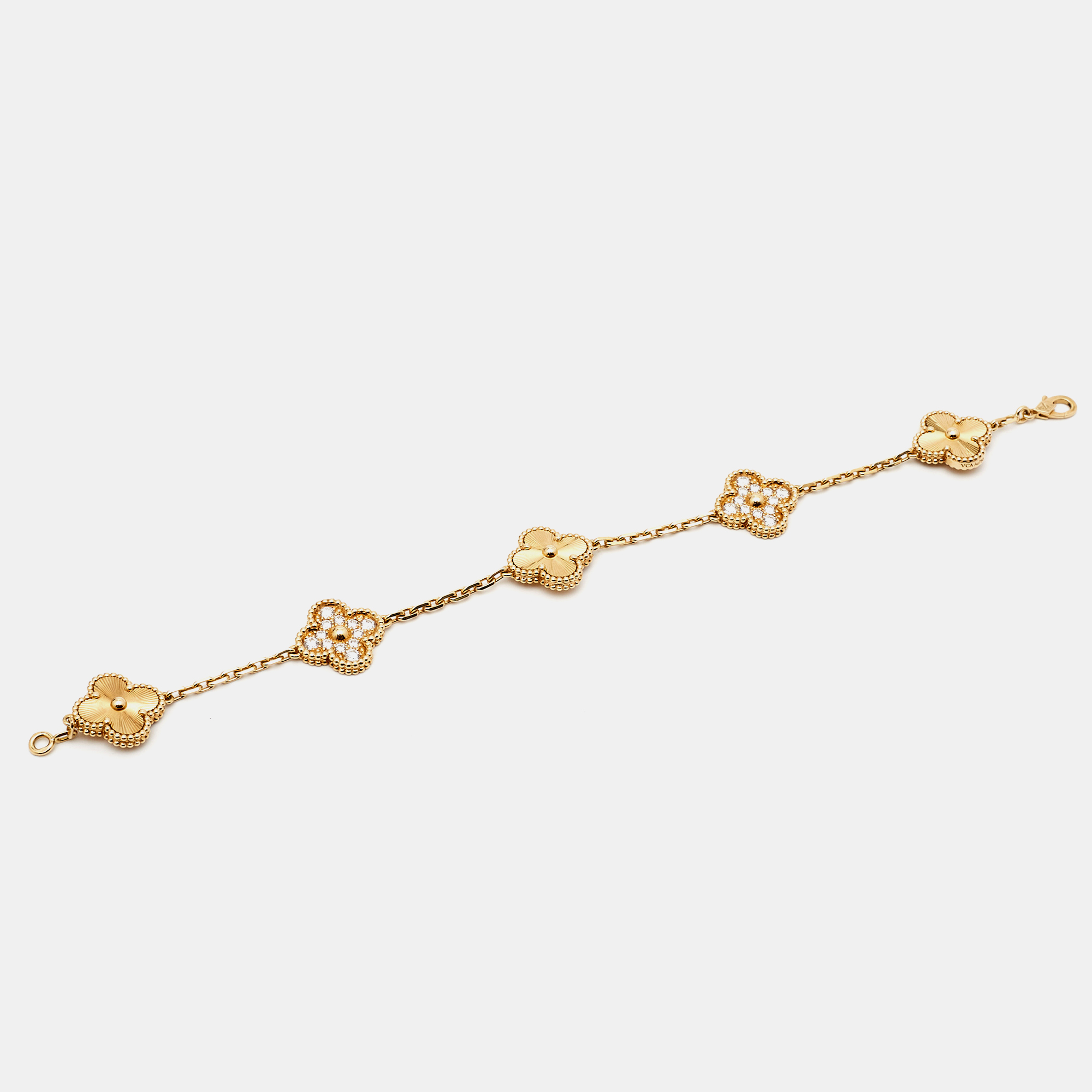 

Van Cleef & Arpels Vintage Alhambra Guilloché Diamond 18k Yellow Gold Bracelet