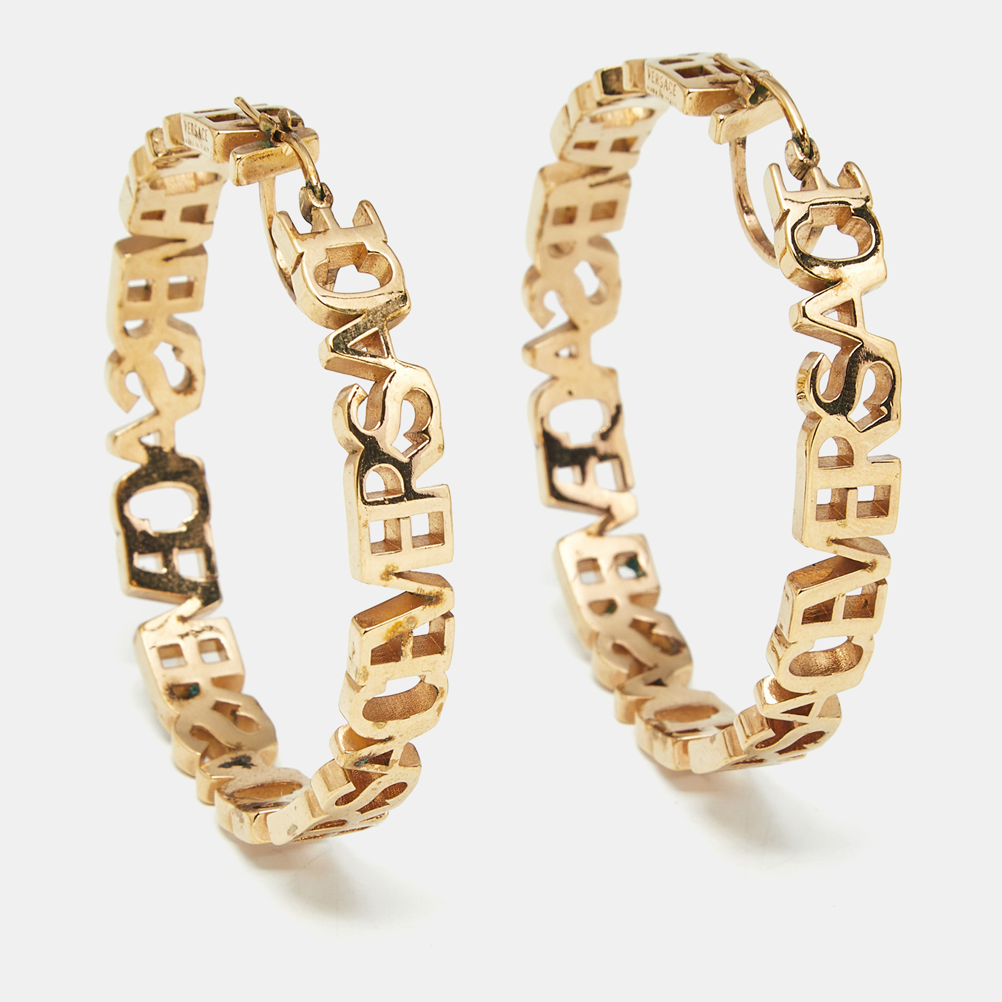 

Versace Logo Gold Tone Hoop Earrings