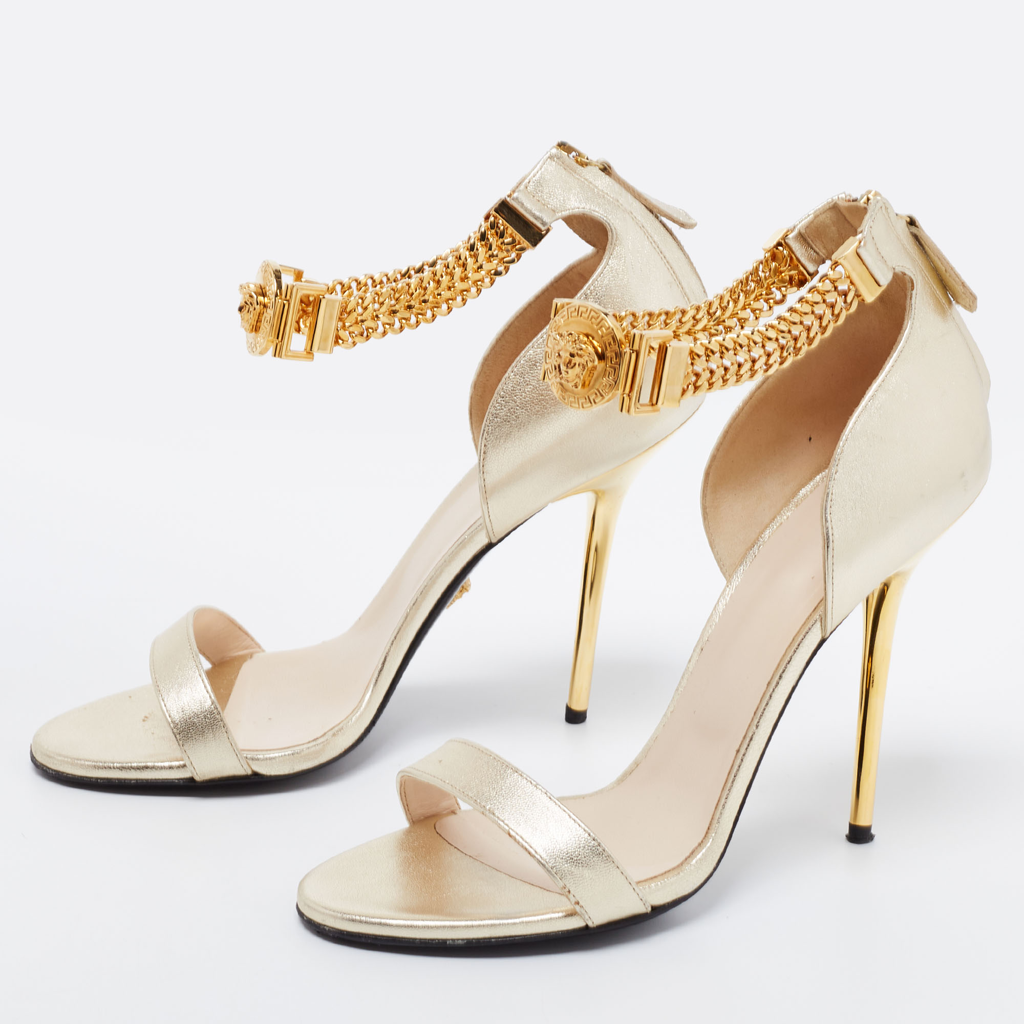 

Versace Metallic Gold Leather Medusa Chain Ankle Strap Sandals Size