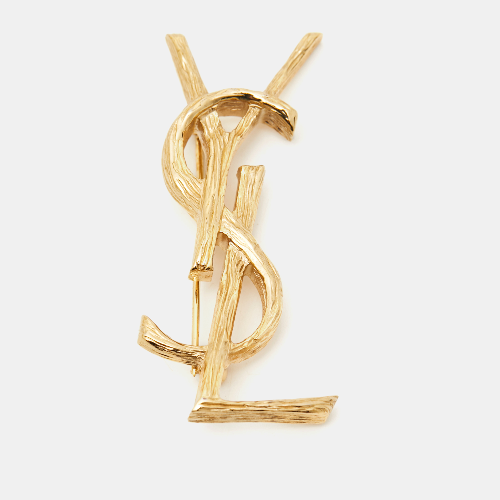 

Yves Saint Laurent Opyum Gold Tone Brooch