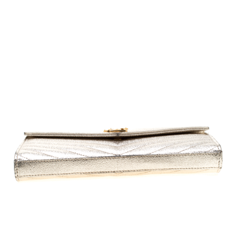 Leather clutch bag Saint Laurent Gold in Leather - 22519424