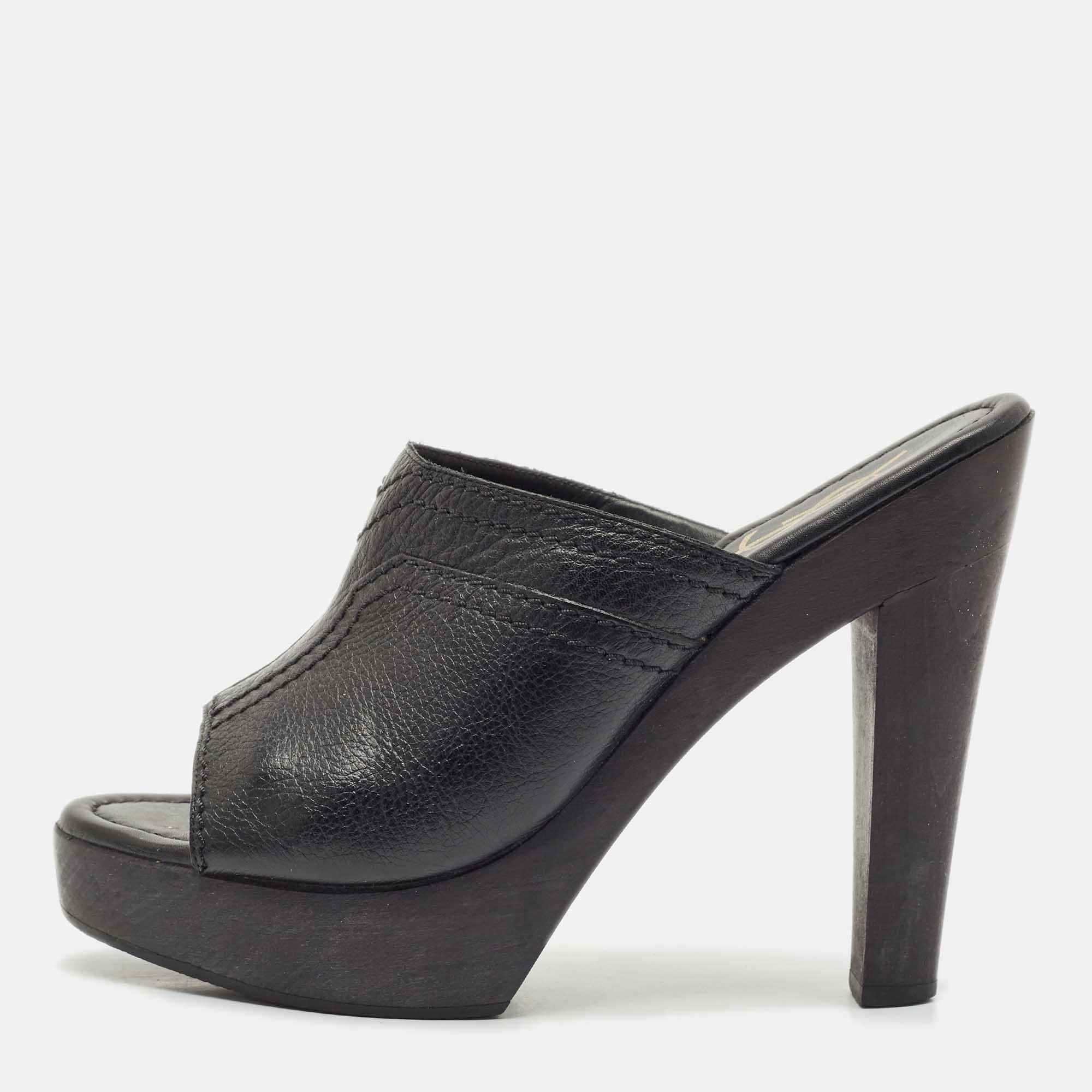 

Yves Saint Laurent Black Leather Wooden Platform Mules Size