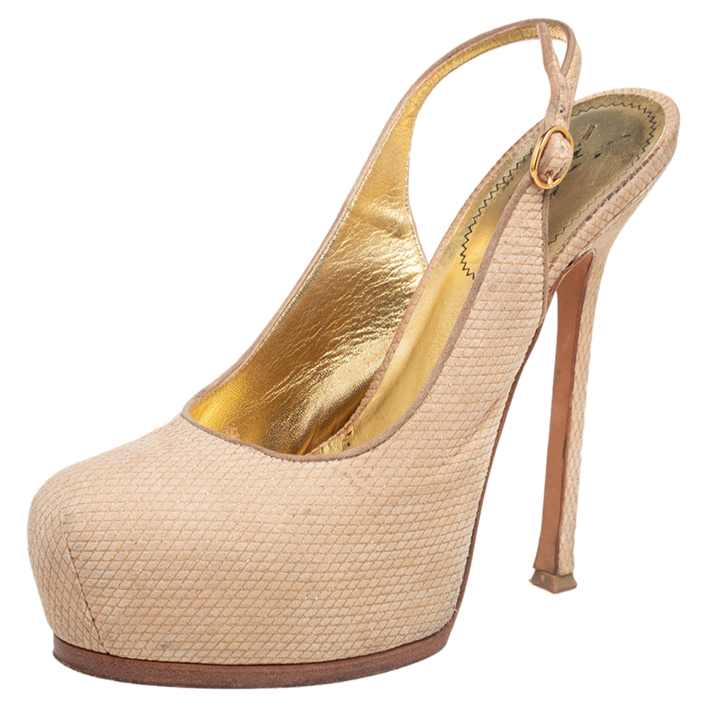 Fashionable and bright these Tribtoo pumps from Yves Saint Laurent will add beauty and style to your closet. Crafted from snakeskin embossed suede the pumps have a cream shade slingbacks concealed platforms and 15 cm heels.