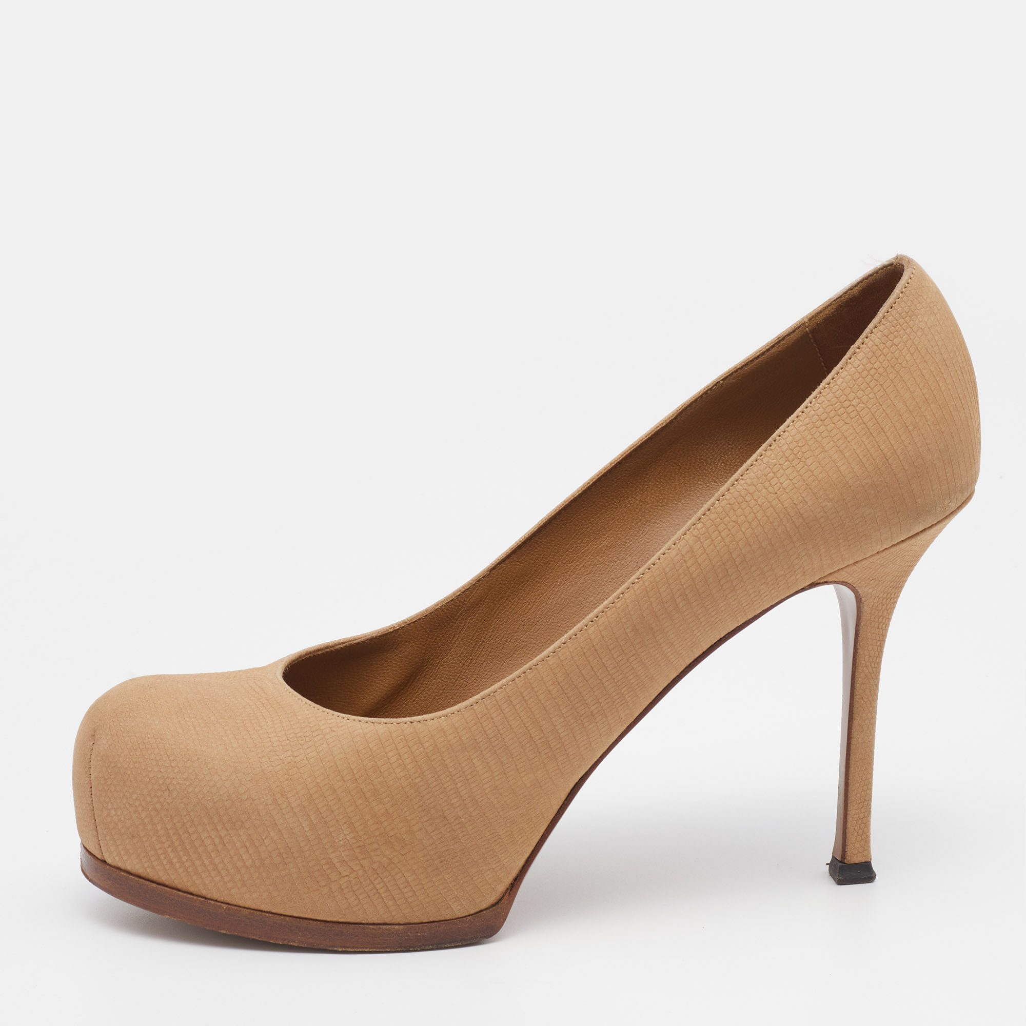 Cut into a timeless silhouette this pair of Tribtoo pumps from Yves Saint Laurent is simple yet classy. Created from leather it flaunts platforms 11cm heels and comfortable footbeds.