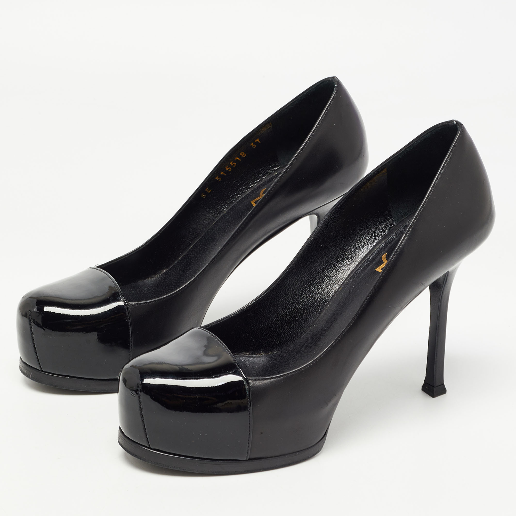 

Yves Saint Laurent Black Leather and Patent Tribtoo Pumps Size